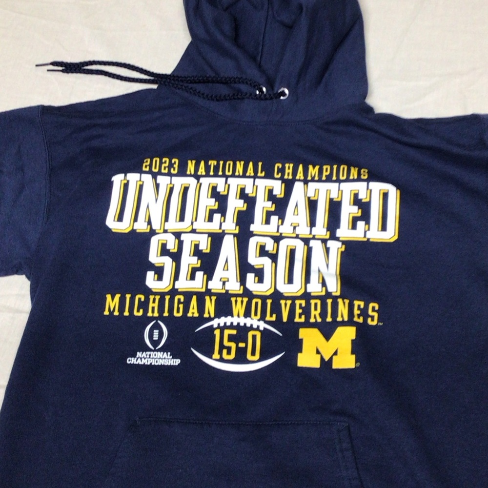 Hanes Navy Blue Hoodie with Yellow Accents.    Michigan wolverines 2023 champs
